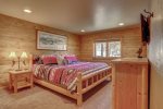 Couloir Cabin master with queen log bed. 